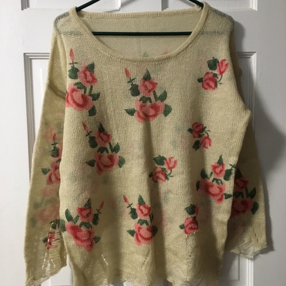 Distressed look floral sweater